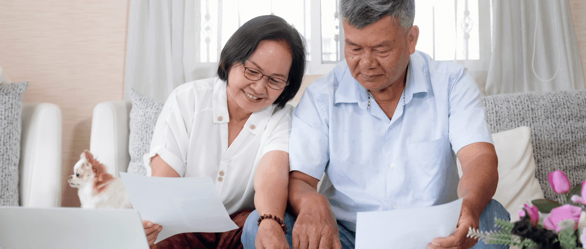 older couple looking at papers