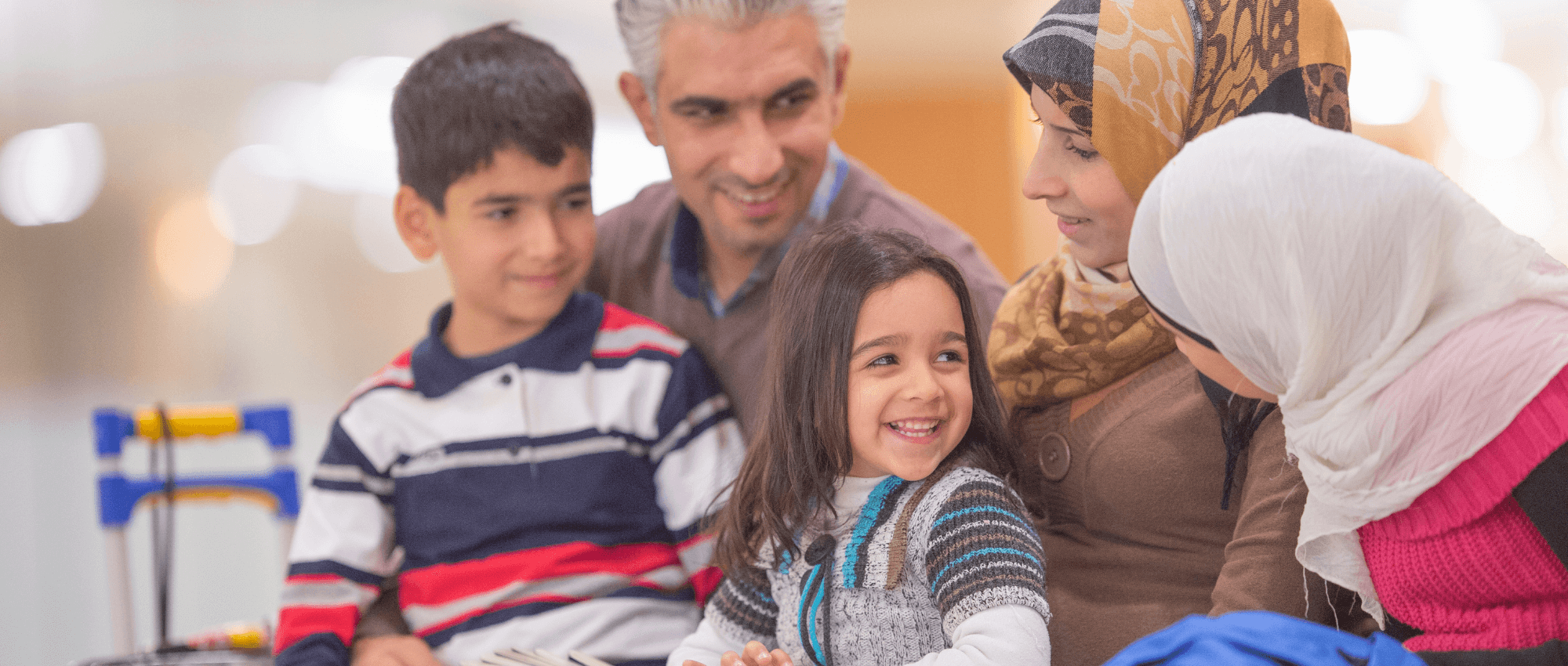 newcomer family at airport