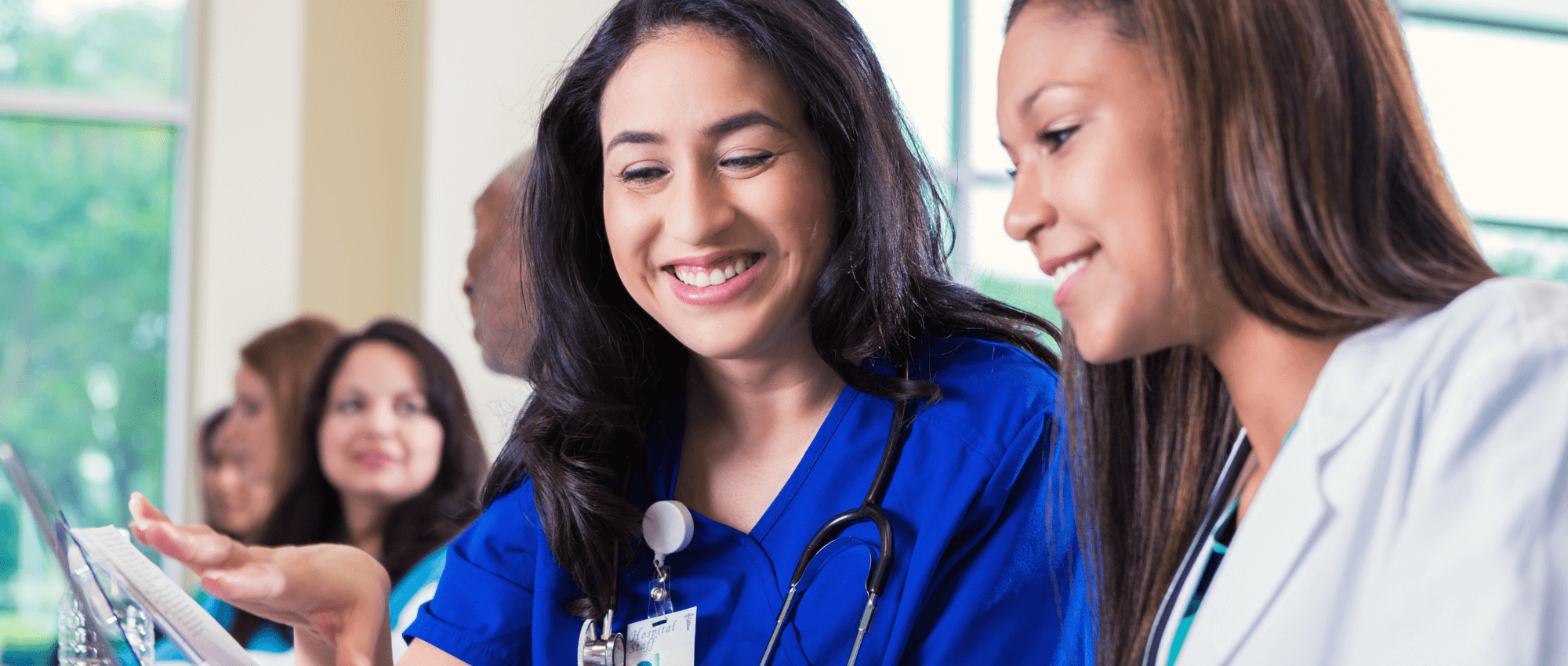 Nurse explaining to doctor