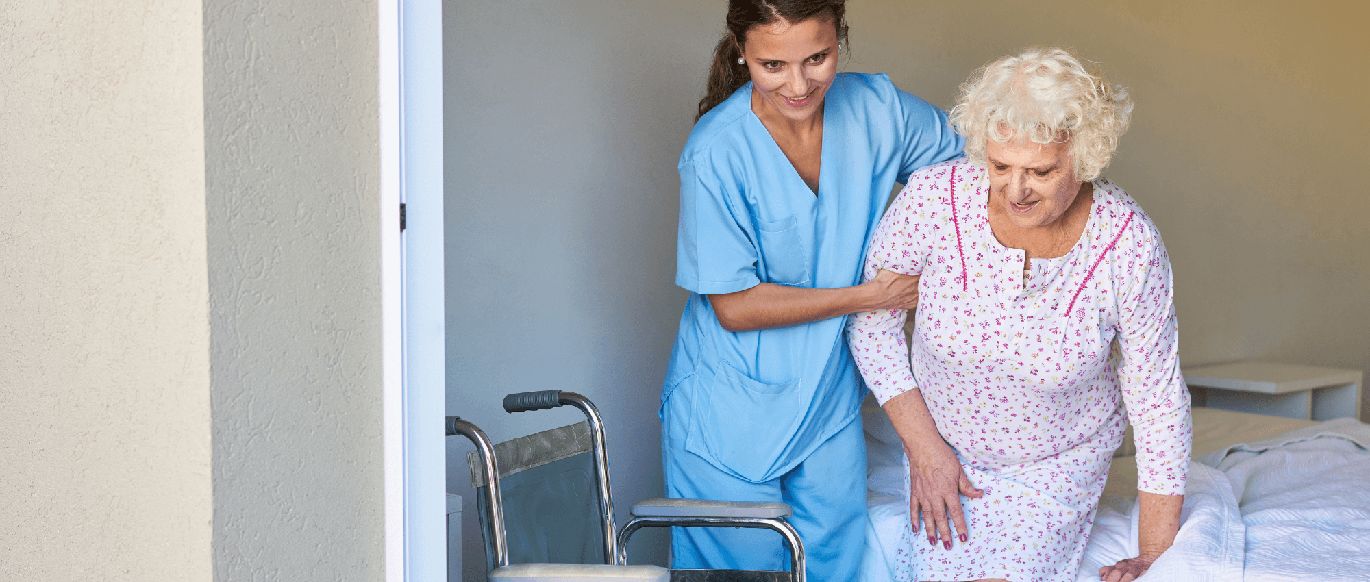 A nurse helping a senior