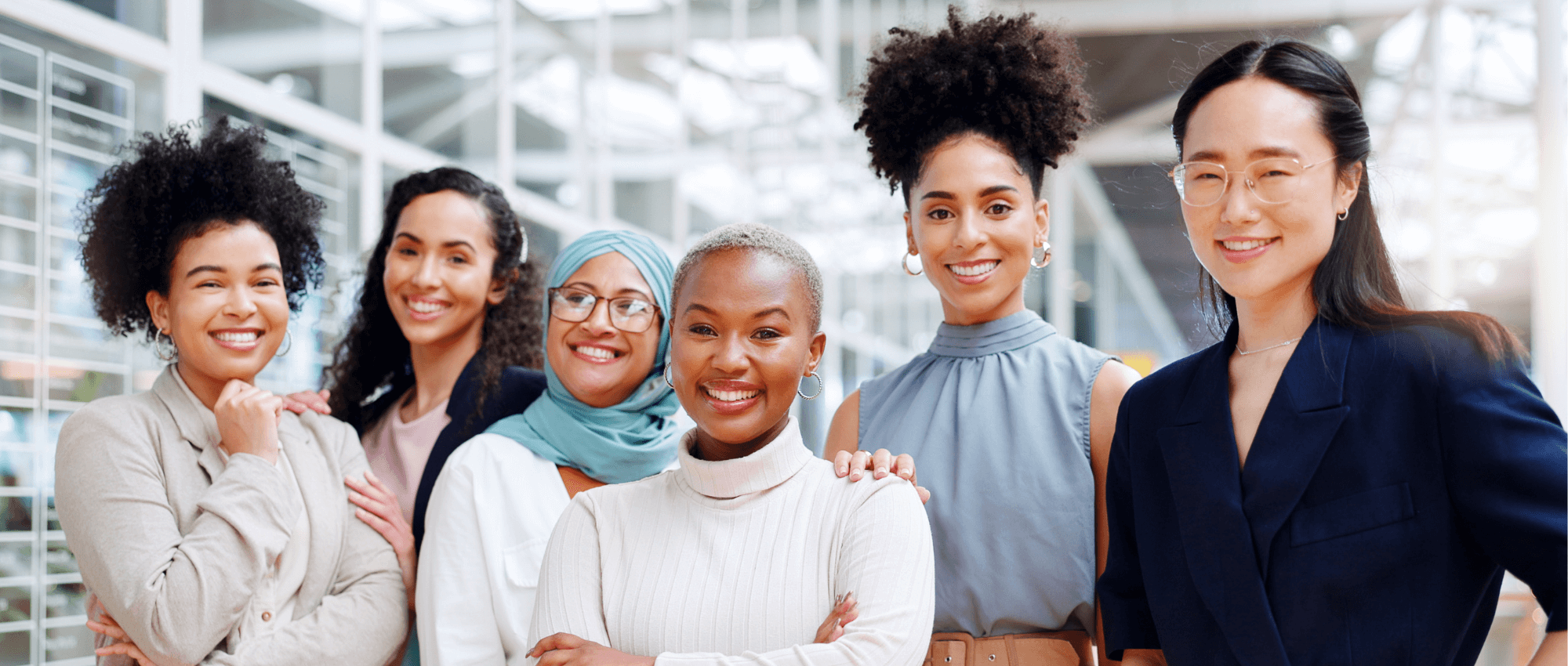 6 Successful women smiling to the camera