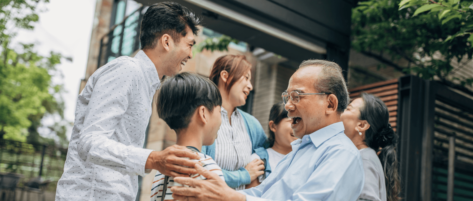 Asian family sharing greetings